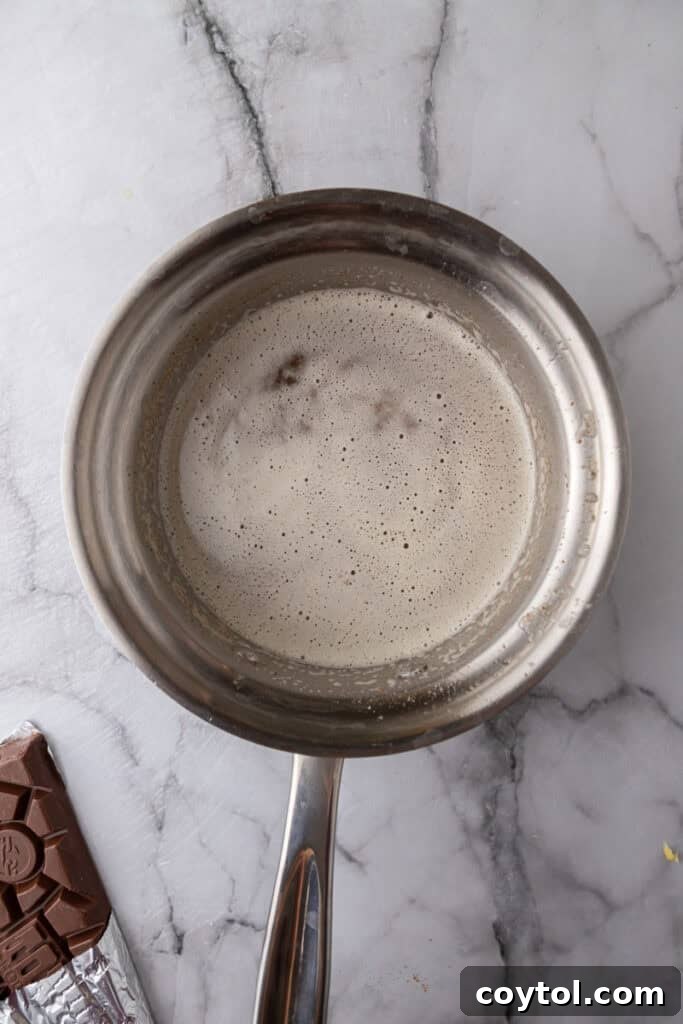 Butter melting in a saucepan for browning
