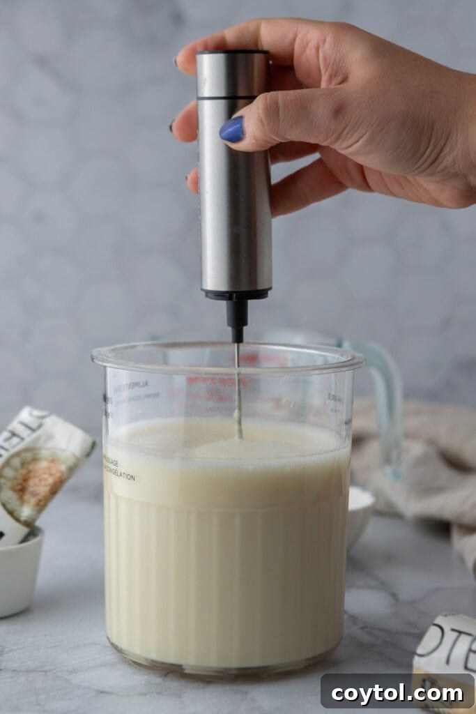 Hand frothing ice cream
