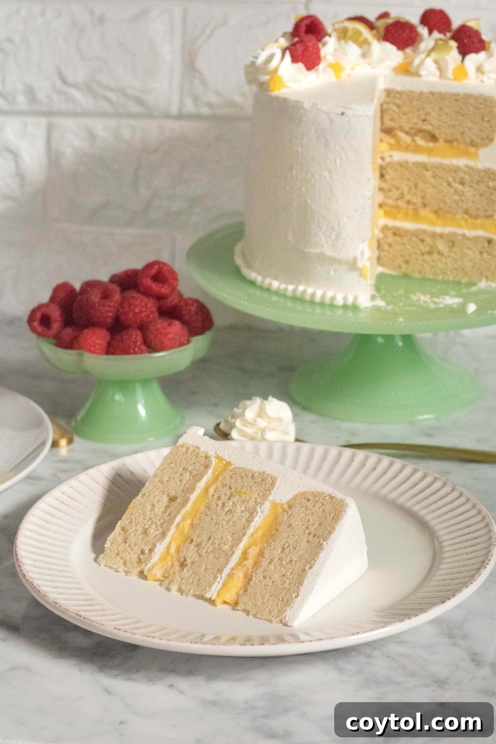 Triple-Layer Vanilla Cake with Lemon Curd and Italian Buttercream 5 Layered Vanilla cake with lemon curd and Italian vanilla bean buttercream close up