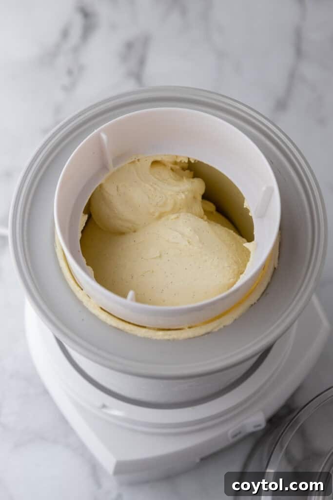 Velvet Vanilla Custard Ice Cream Made Simple 14 custard mixture being churned in an ice cream maker