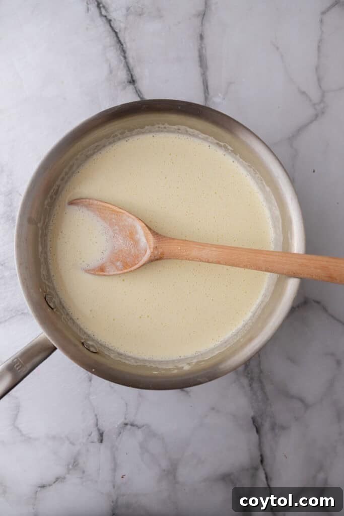 Velvet Vanilla Custard Ice Cream Made Simple 9 custard mixture poured back into the pot for cooking