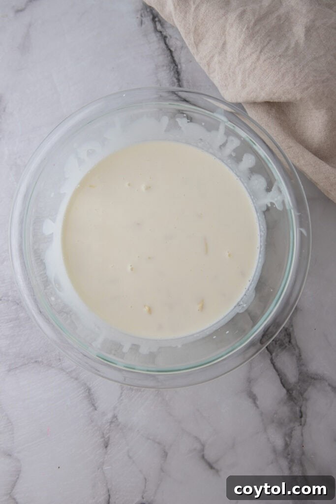 The Ultimate White Chocolate Ganache Recipe 6 ingredients in a bowl