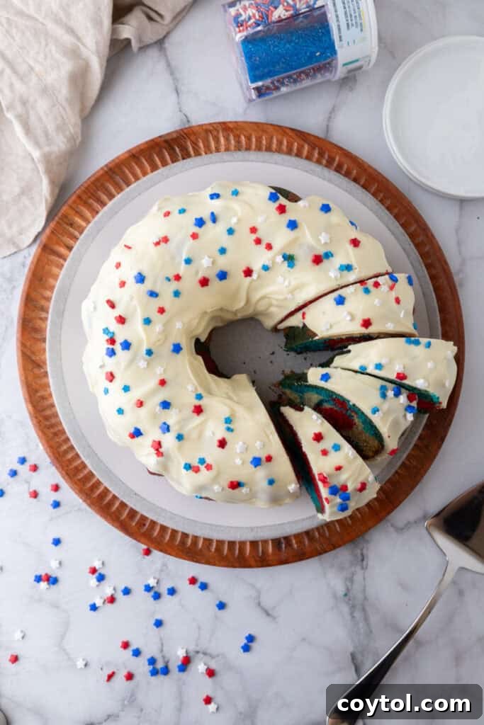 fully made red white and blue bundt cake recipe with frosting on it