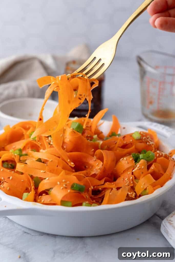 Carrot Ribbon Salad Recipe getting picked up by a fork