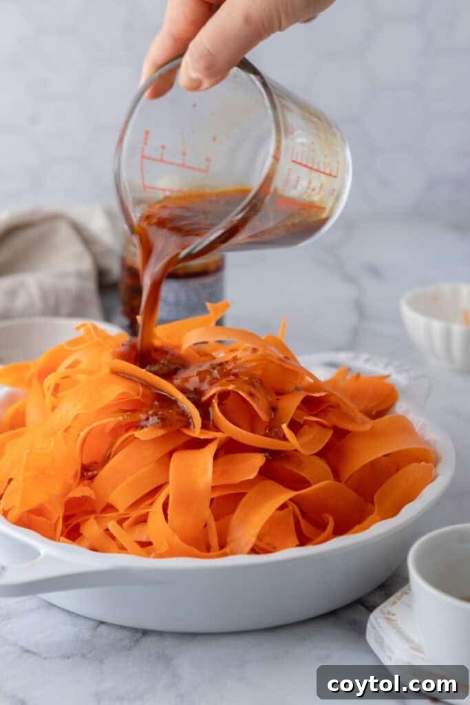 sauce ingredients in a cup getting poured