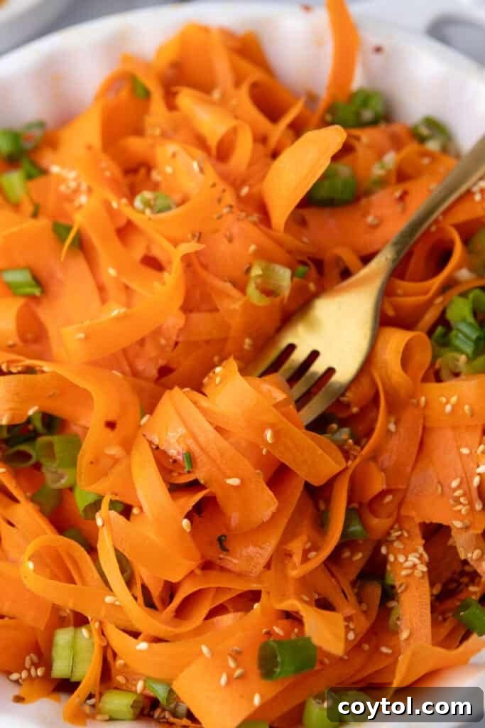 Carrot Ribbon Salad Recipe getting picked up by a fork