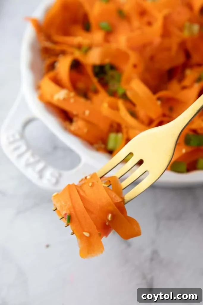 Carrot Ribbon Salad Recipe getting picked up by a fork