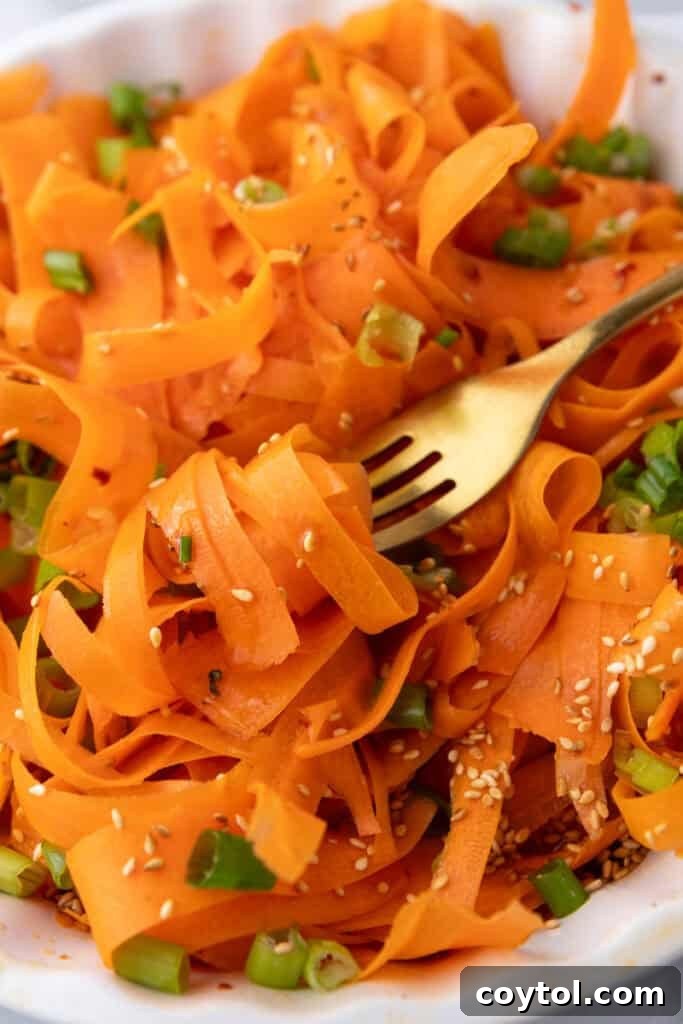 Carrot Ribbon Salad Recipe getting picked up by a fork