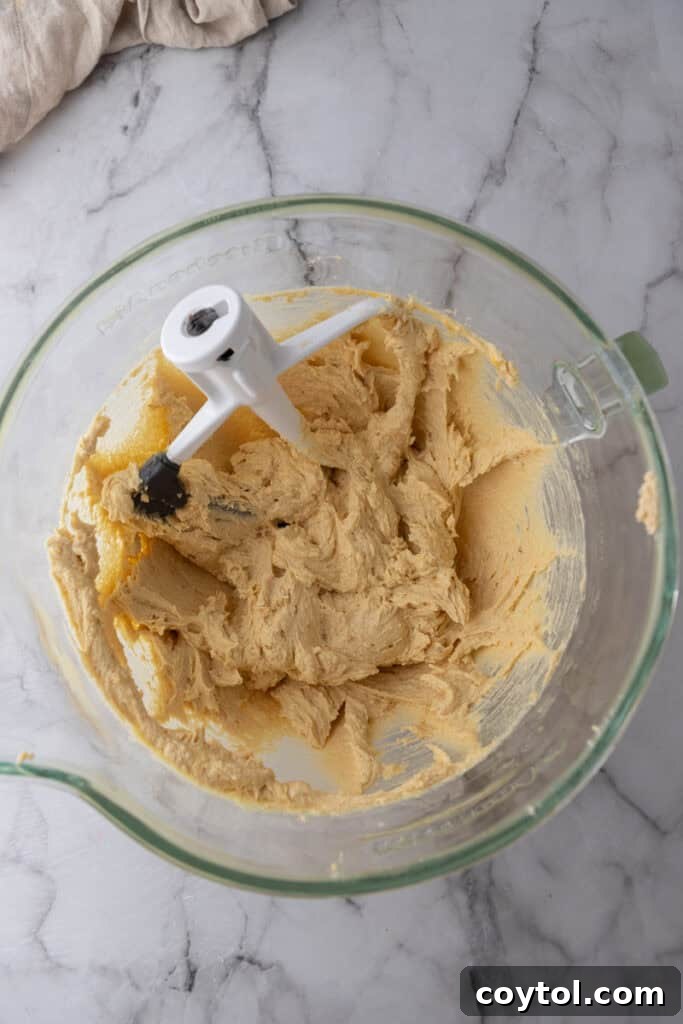 The Ultimate Jacques Torres Inspired Chocolate Chip Cookies 7 ingredients in a bowl