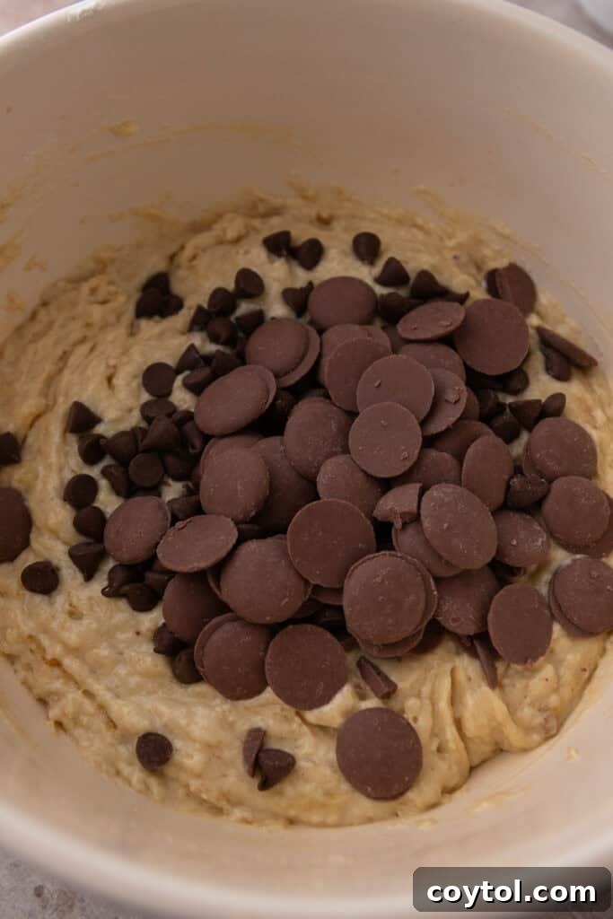 Bake Bakery-Perfect Banana Chocolate Chip Muffins 8 ingredients in a bowl