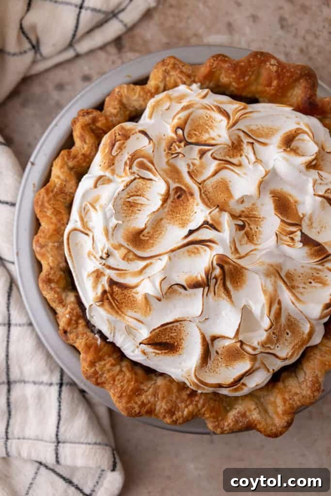 Fluffy Chocolate Meringue Pie Perfection 18 topping being toasted