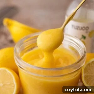 Yuzu Curd Recipe in a jar with a spoon