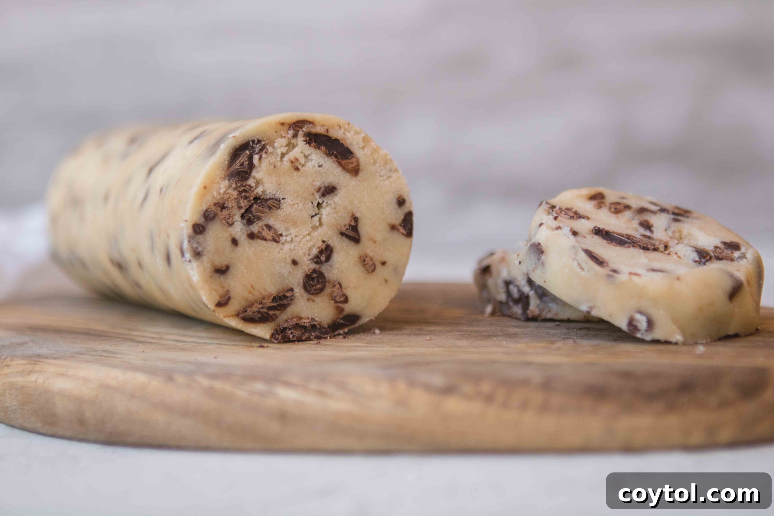 Brown Sugar Free Chocolate Chip Cookies 5 Unbaked cookie dough logs prepared for freezing and future slicing.
