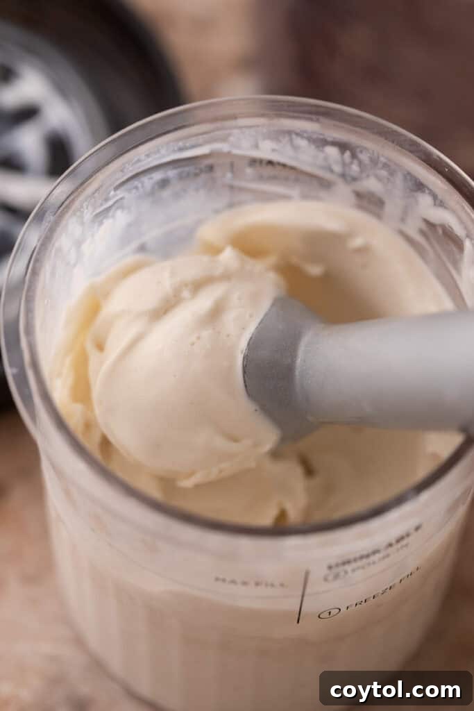 High-protein Ninja Creami cottage cheese ice cream being scooped, showing its creamy texture