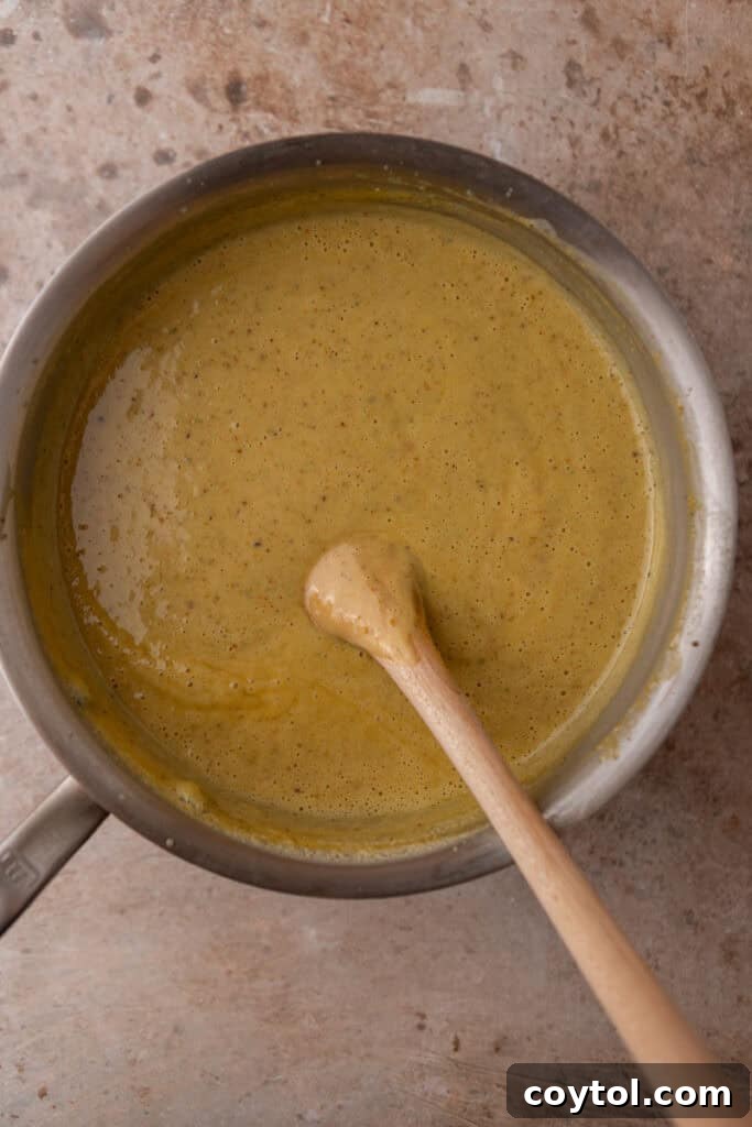 Crafting the Ultimate Homemade Pistachio Ice Cream 11 Custard thickening on the stove