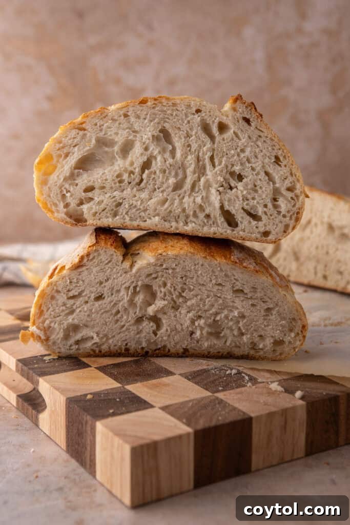 Another side view of a baked same day sourdough bread loaf, highlighting its rustic texture.