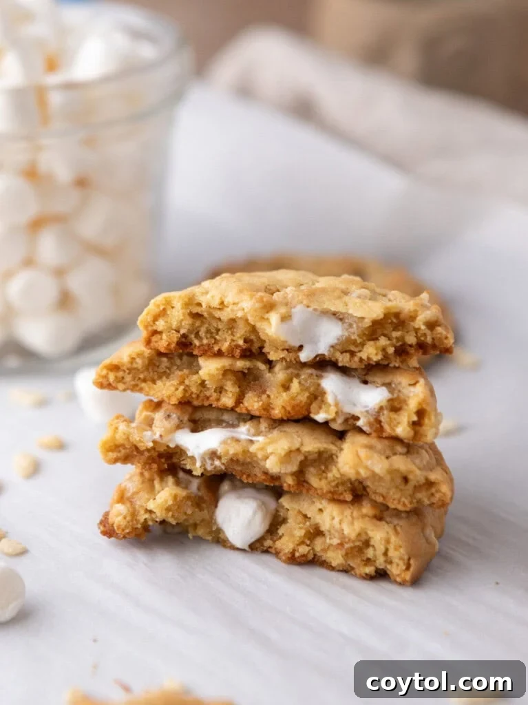 Stack of Costco Marshmallow Crispy Cookies, showcasing their golden-brown edges and gooey marshmallow centers.