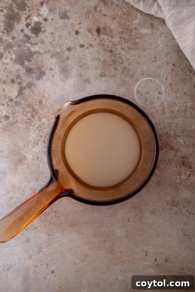 water and sugar in a pot