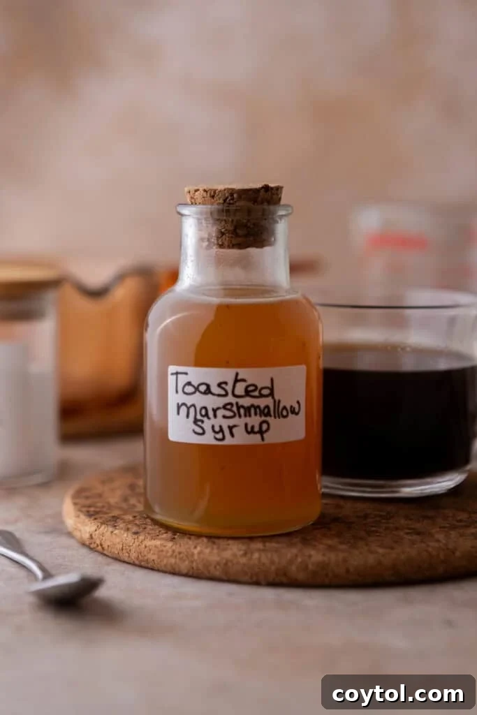 Homemade toasted marshmallow syrup recipe in a jar