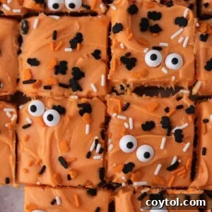 Halloween sugar cookie bars with festive sprinkles