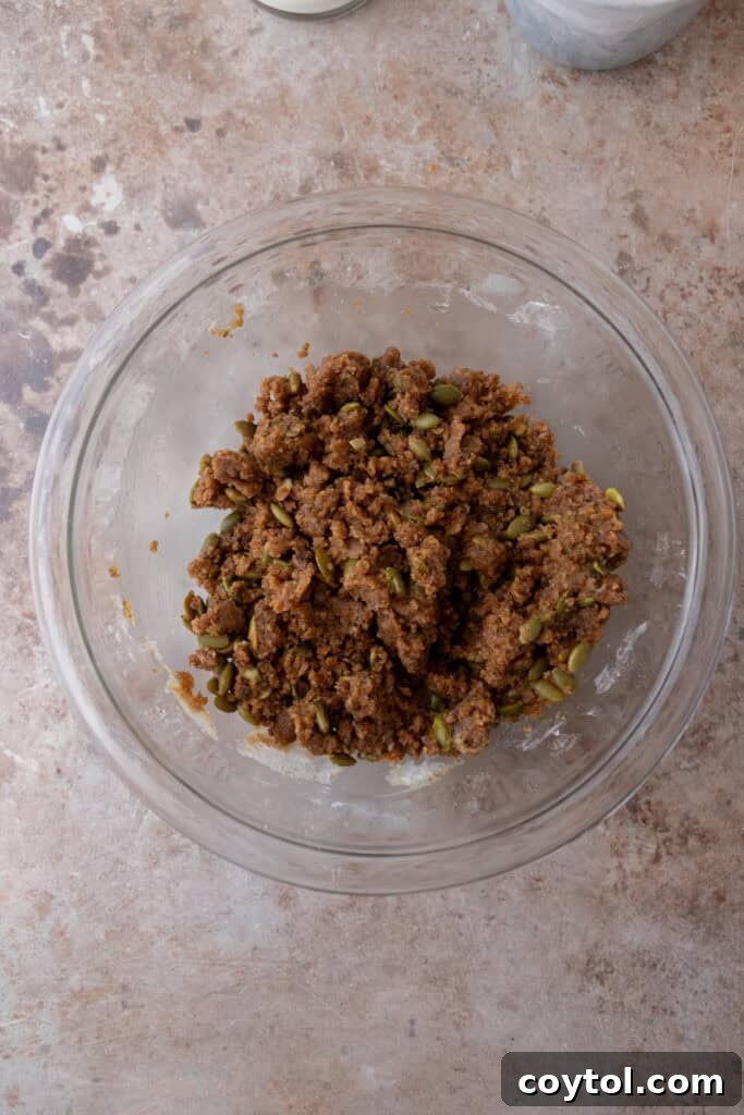 Mixed streusel topping with pepitas in a bowl.