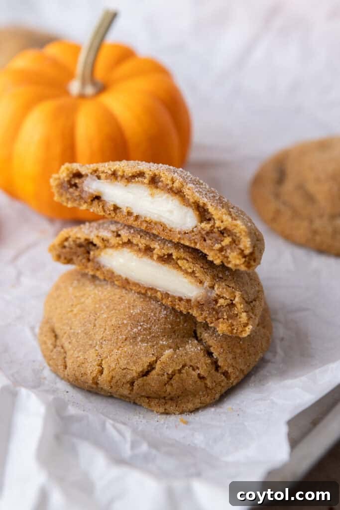 Pumpkin Cheesecake Cookies stacked on each other