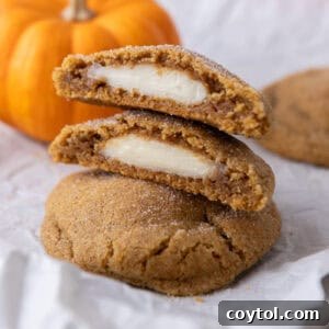 Pumpkin Cheesecake Cookies stacked on each other