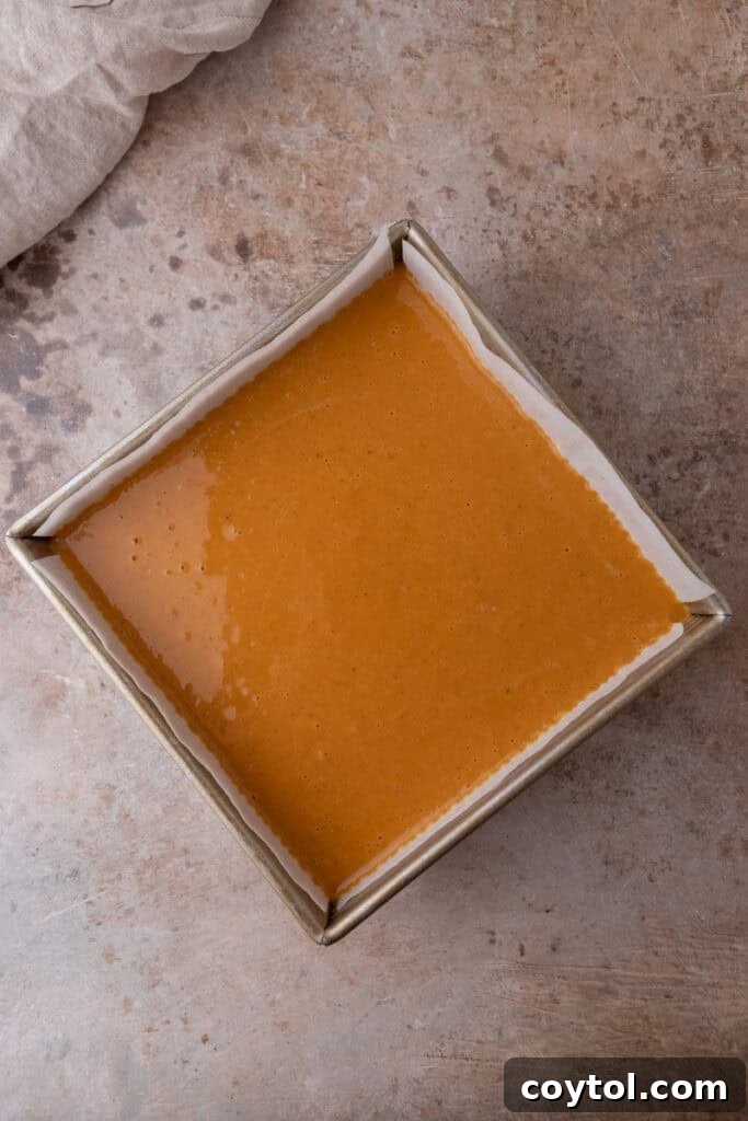 Irresistible Sweet Potato Pie Bars 12 raw filling over baked crust in a pan