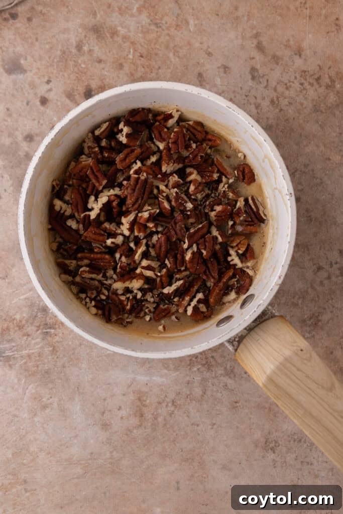 Irresistible Pecan Pie Cheesecake Bites 23 Toasted chopped pecans folded into the rich caramel topping mixture.