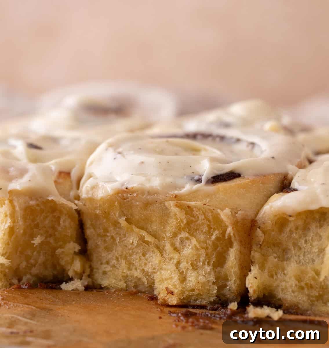 Showing the inside texture of the cut up cinnamon rolls