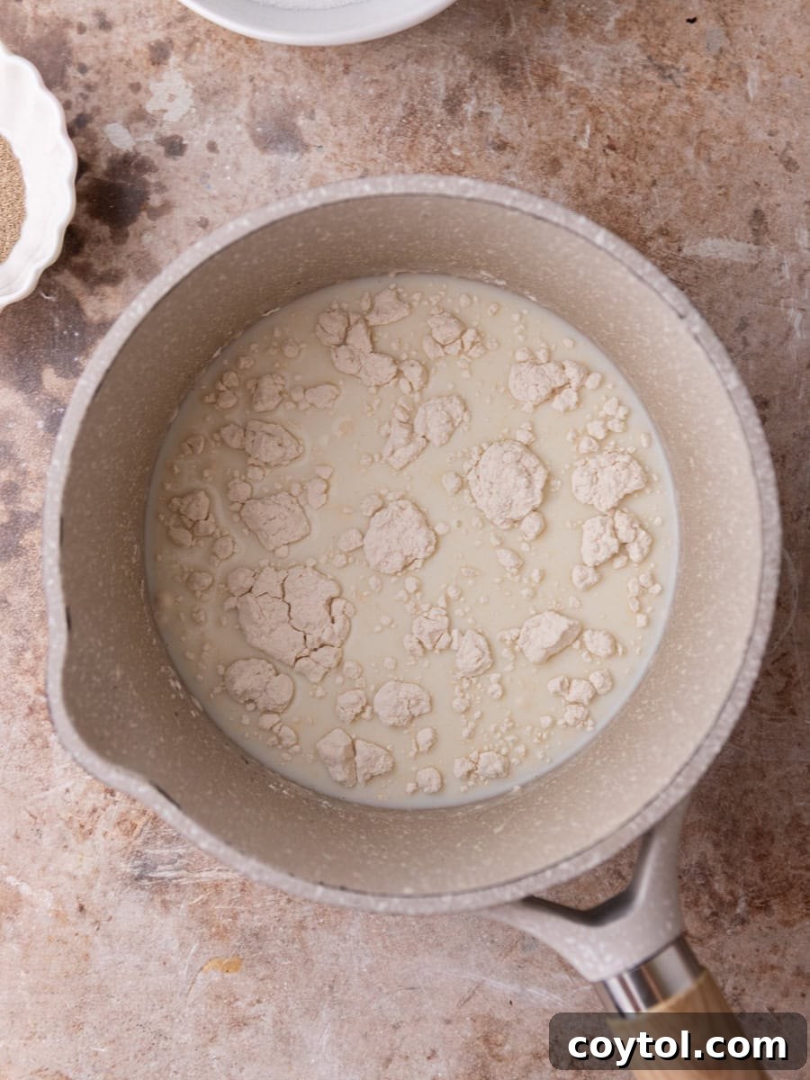  Flour and milk in saucepan to make tangzhong for brioche cinnamon rolls