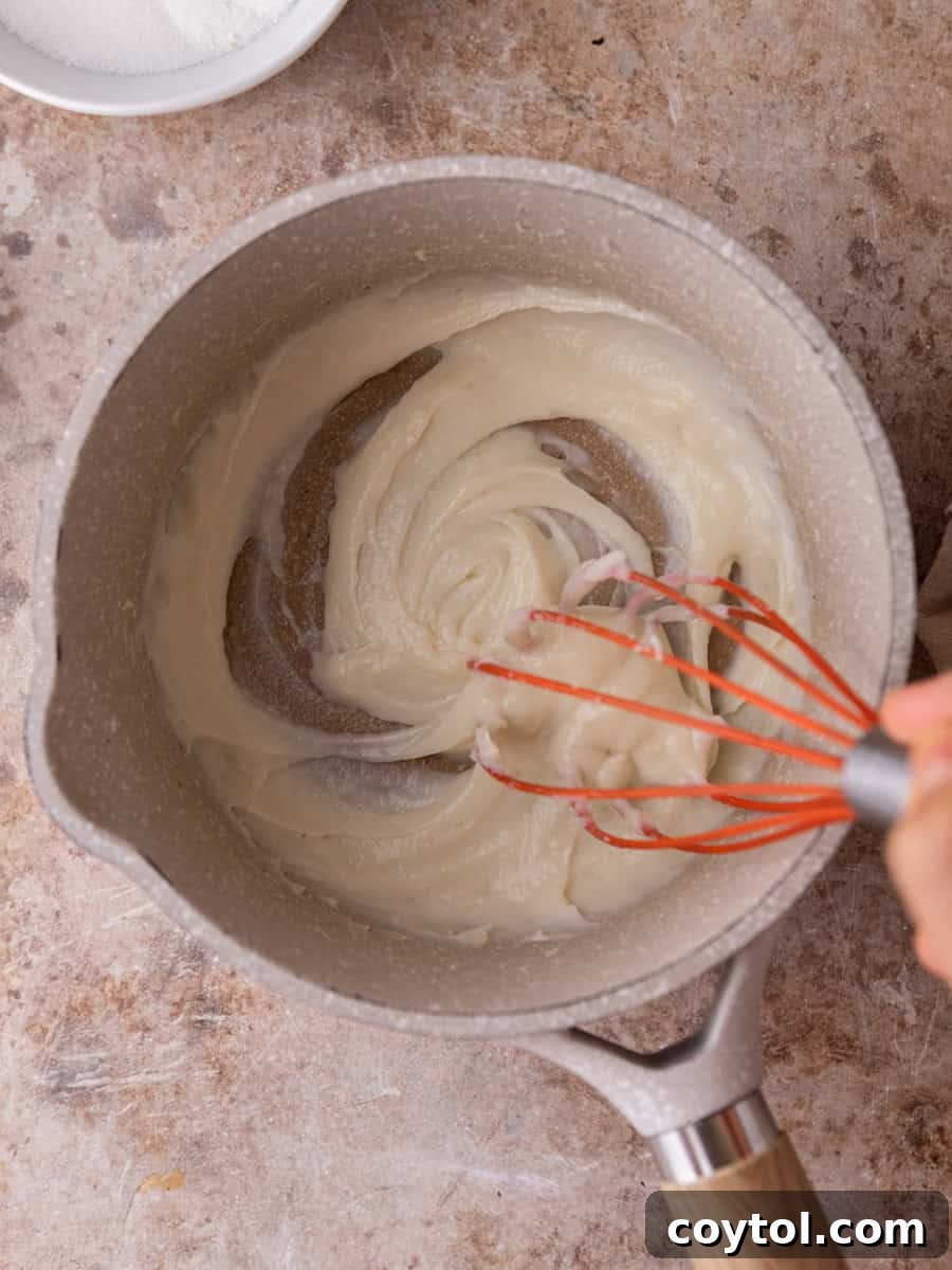 Thickened tangzhong paste in saucepan for cinnamon roll dough