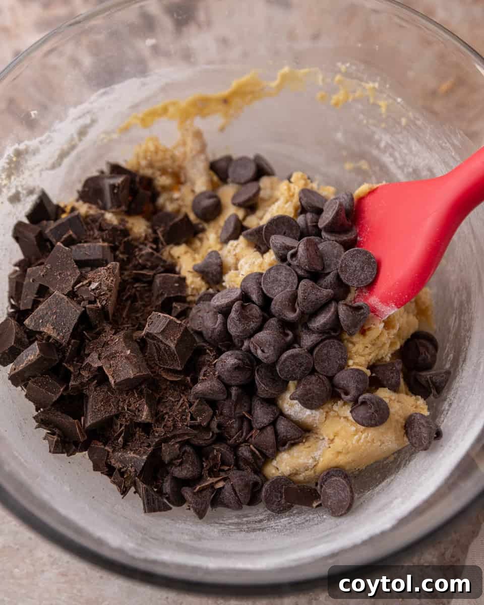 Chocolate chips folded into cream cheese cookie dough