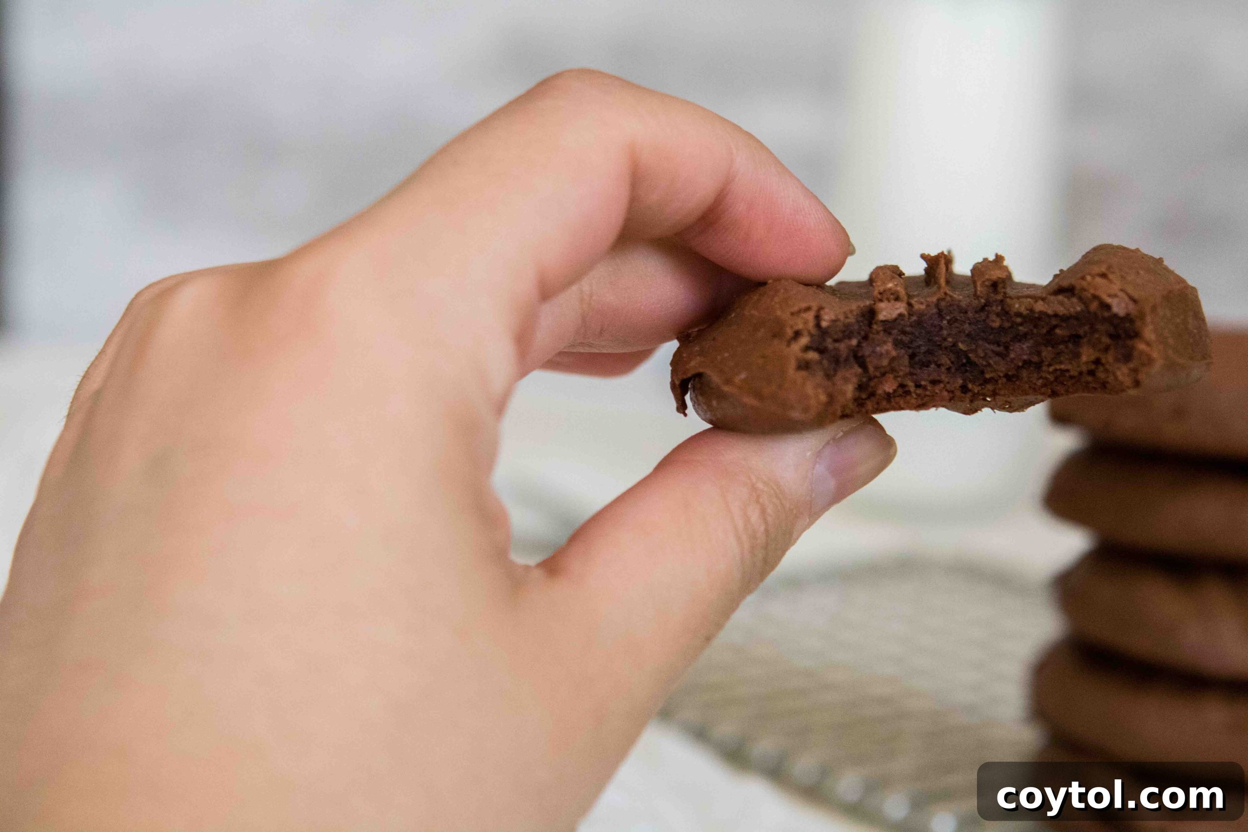 Paleo and gluten free almond butter cookies with a soft fudgy center.