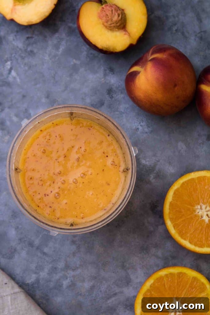 CBD oil healthy anti inflammatory smoothie with fresh peaches