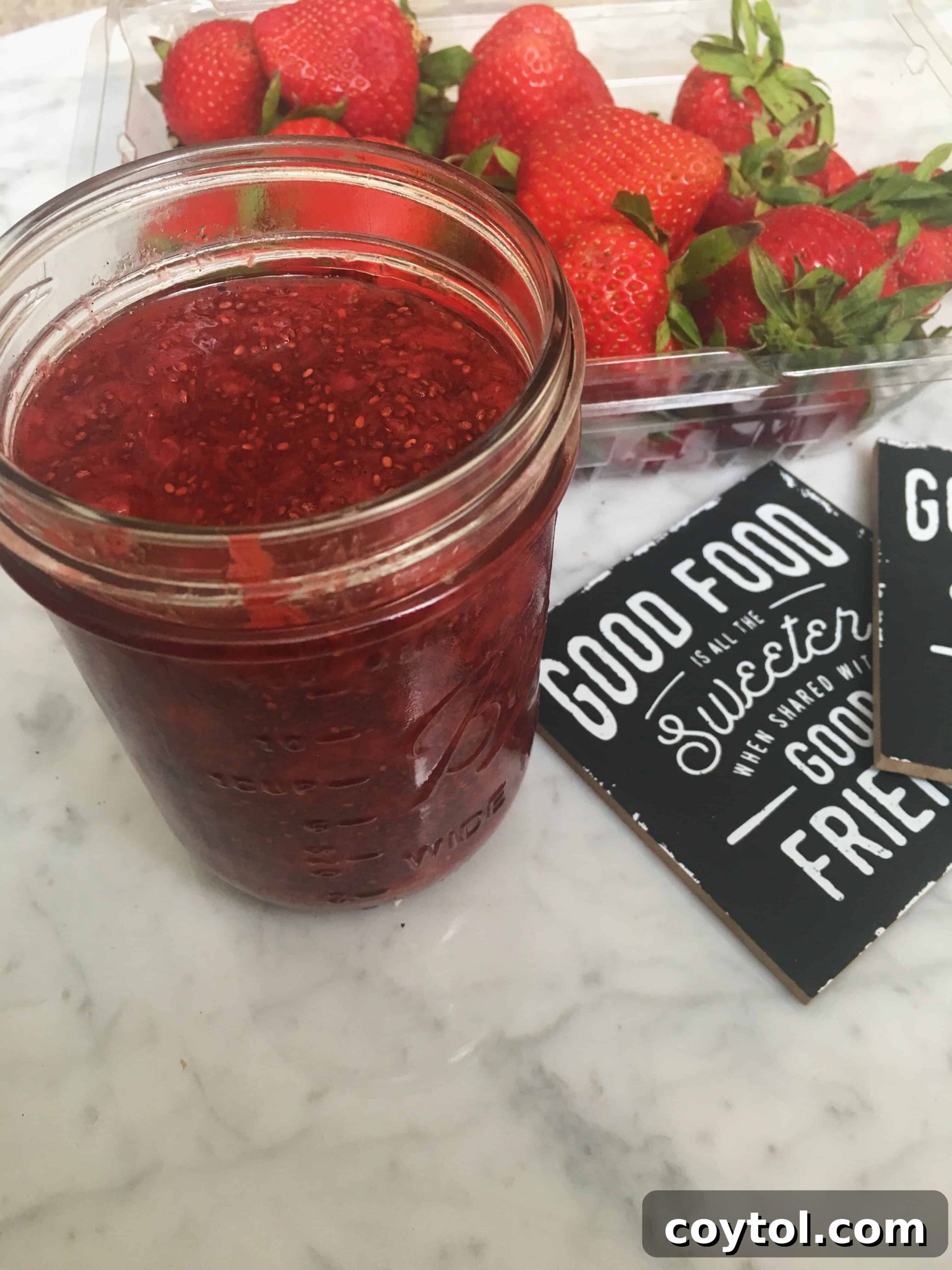 Delicious homemade strawberry chia jam with no sugar added, served in a jar