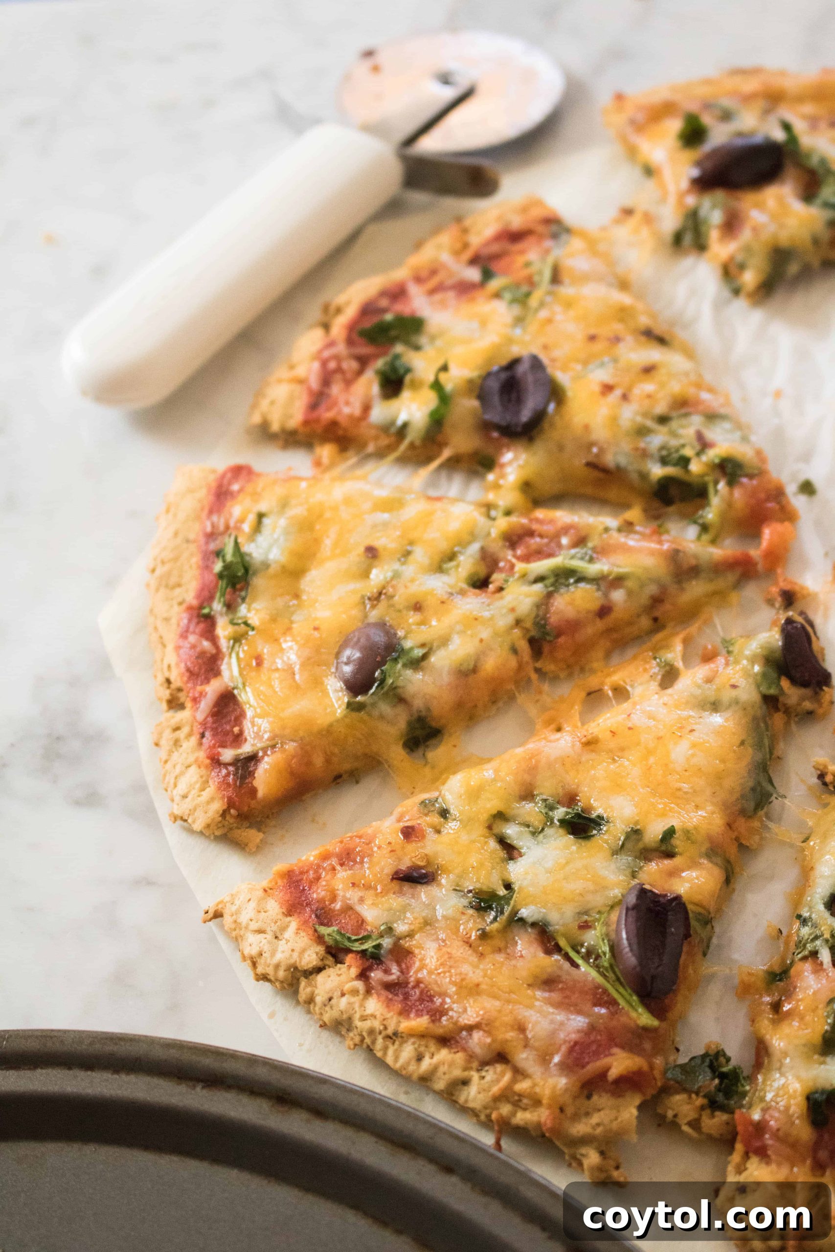 Finished canned chickpea pizza crust with toppings