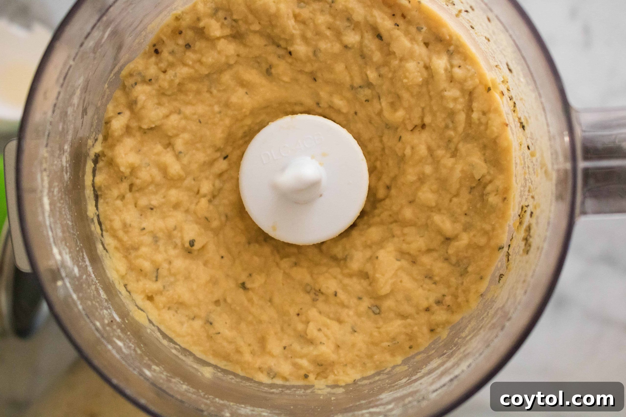 Smooth chickpea pizza crust batter in food processor