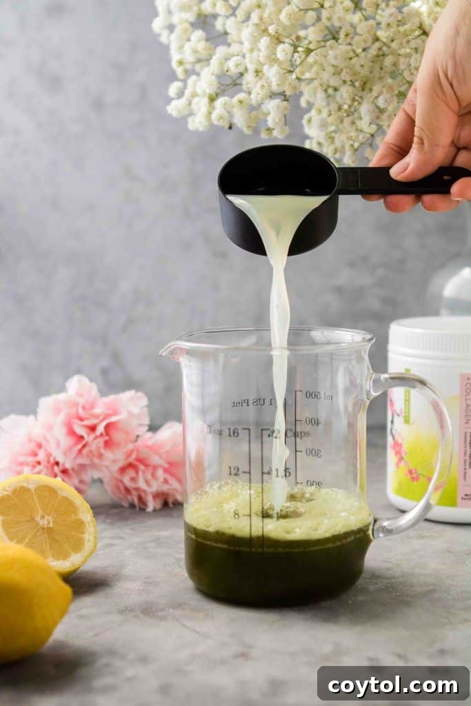 Pouring fresh lemon juice into the matcha mixture