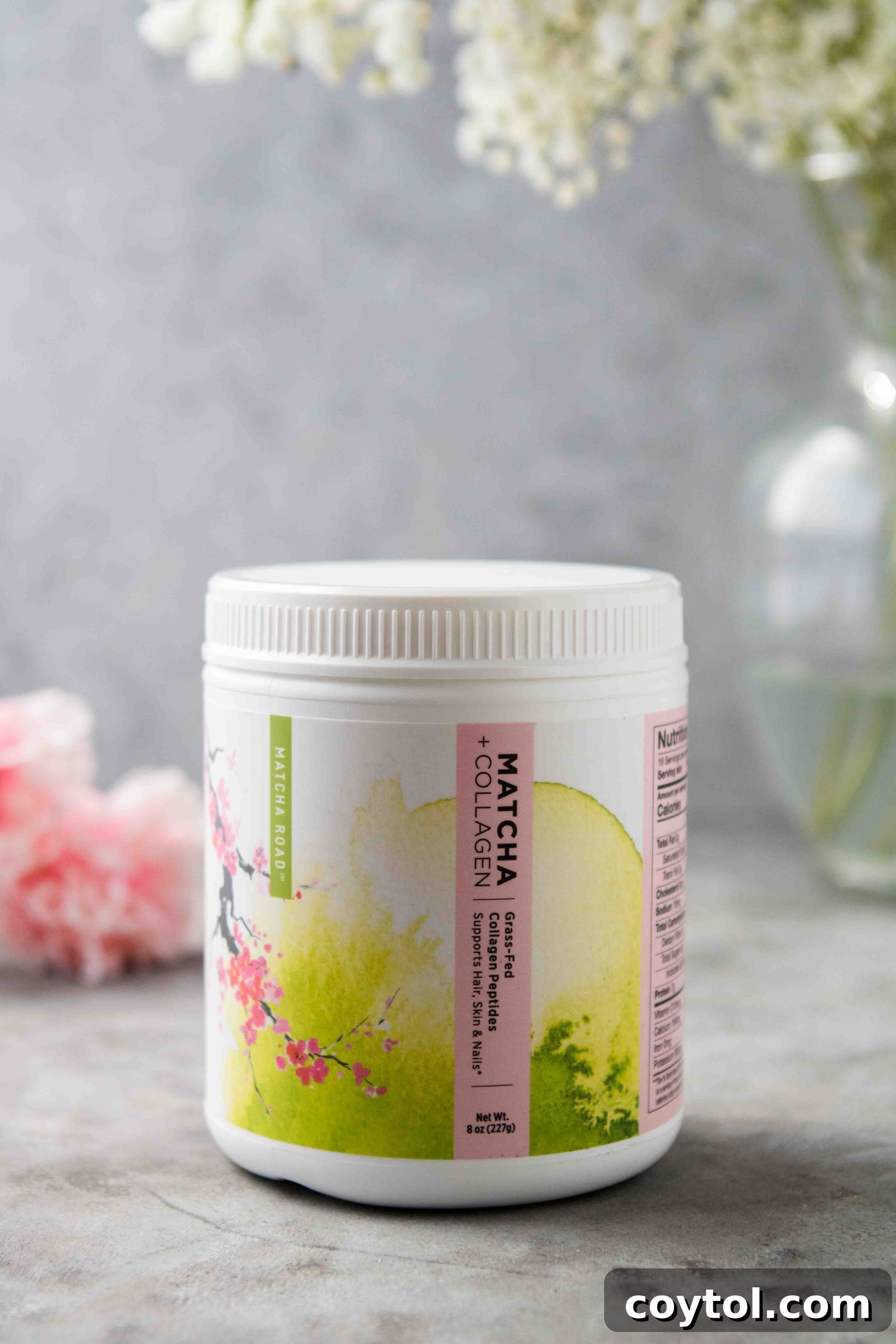 Matcha lemonade with collagen powder and chia seeds on a wooden table