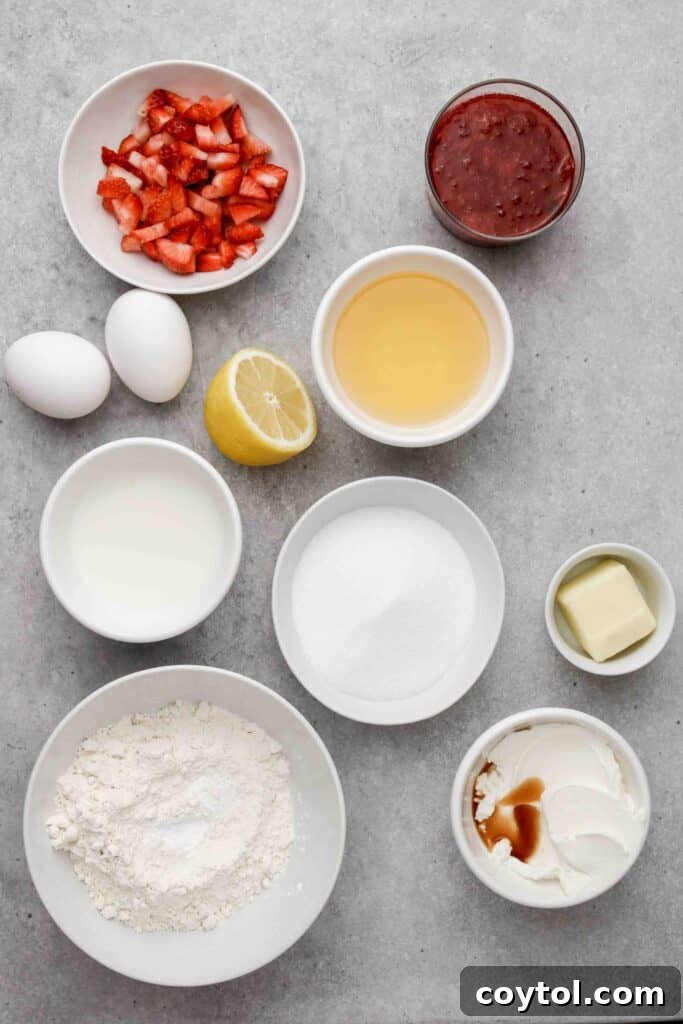 A beautiful flat lay photograph showcasing all the fresh ingredients needed for baking delicious strawberry jam-filled muffins.