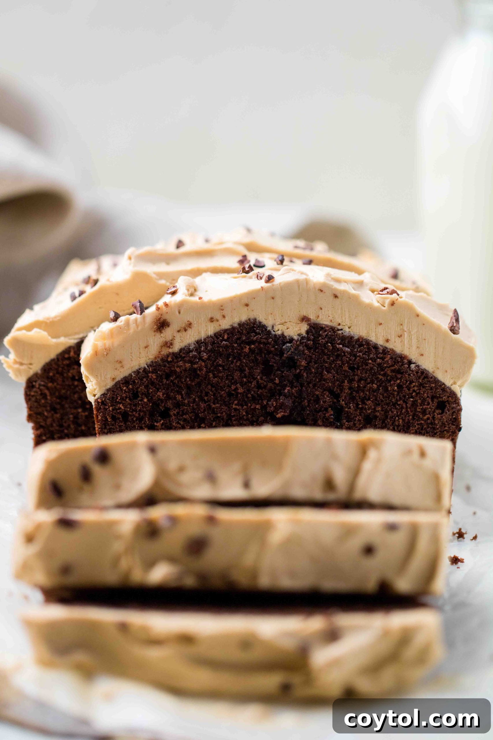 Dense and moist chocolate loaf cake with coffee frosting for tea time