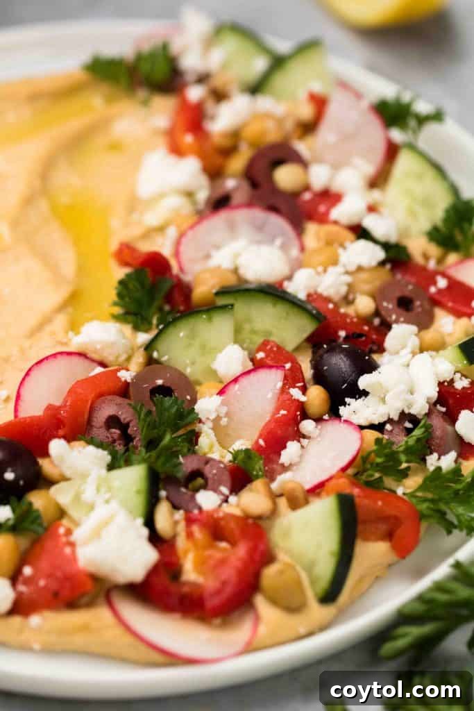 Easy loaded hummus appetizer with fresh vegetables