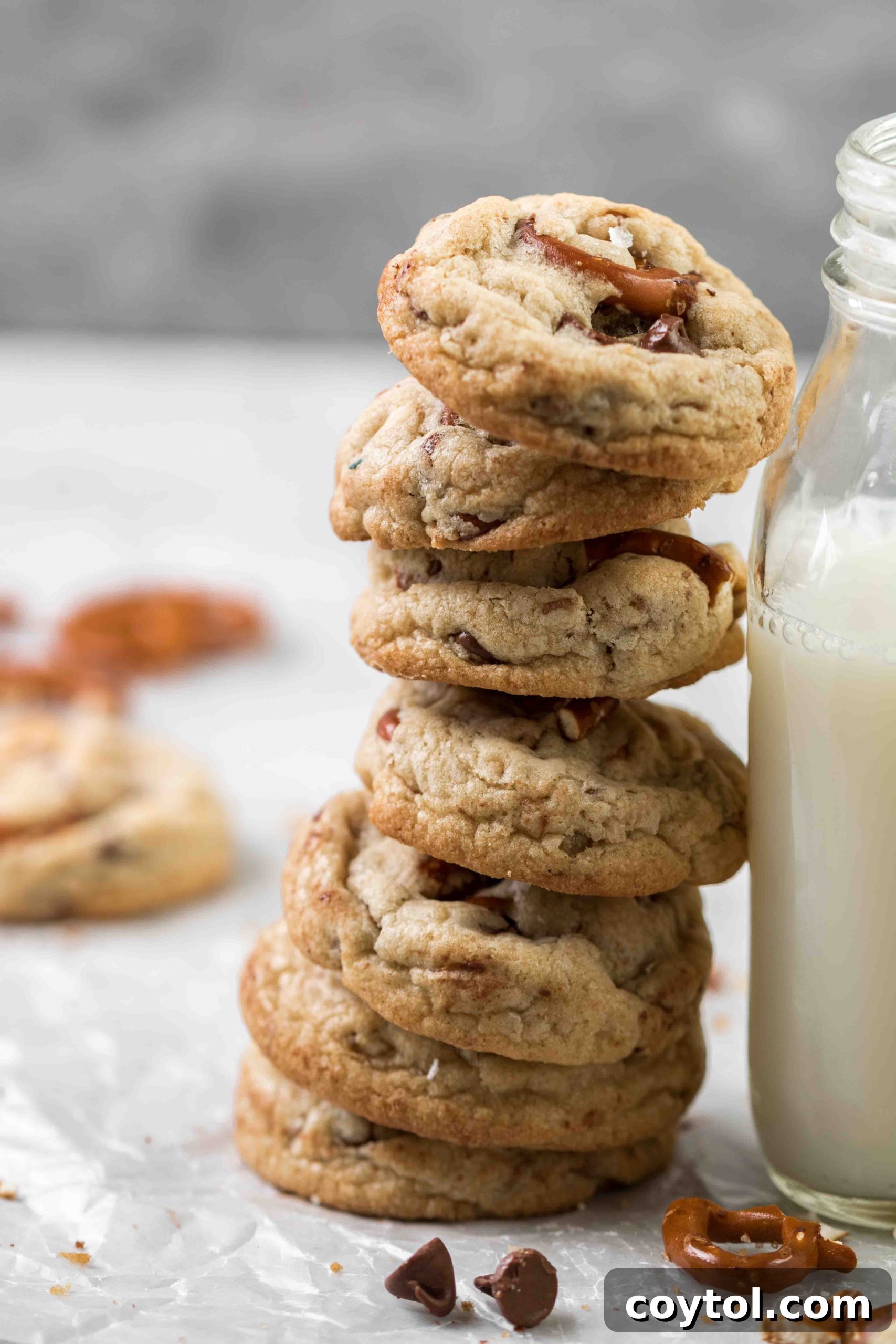 Close-up stack of chocolate chip cookies with pretzels, enticing and delicious