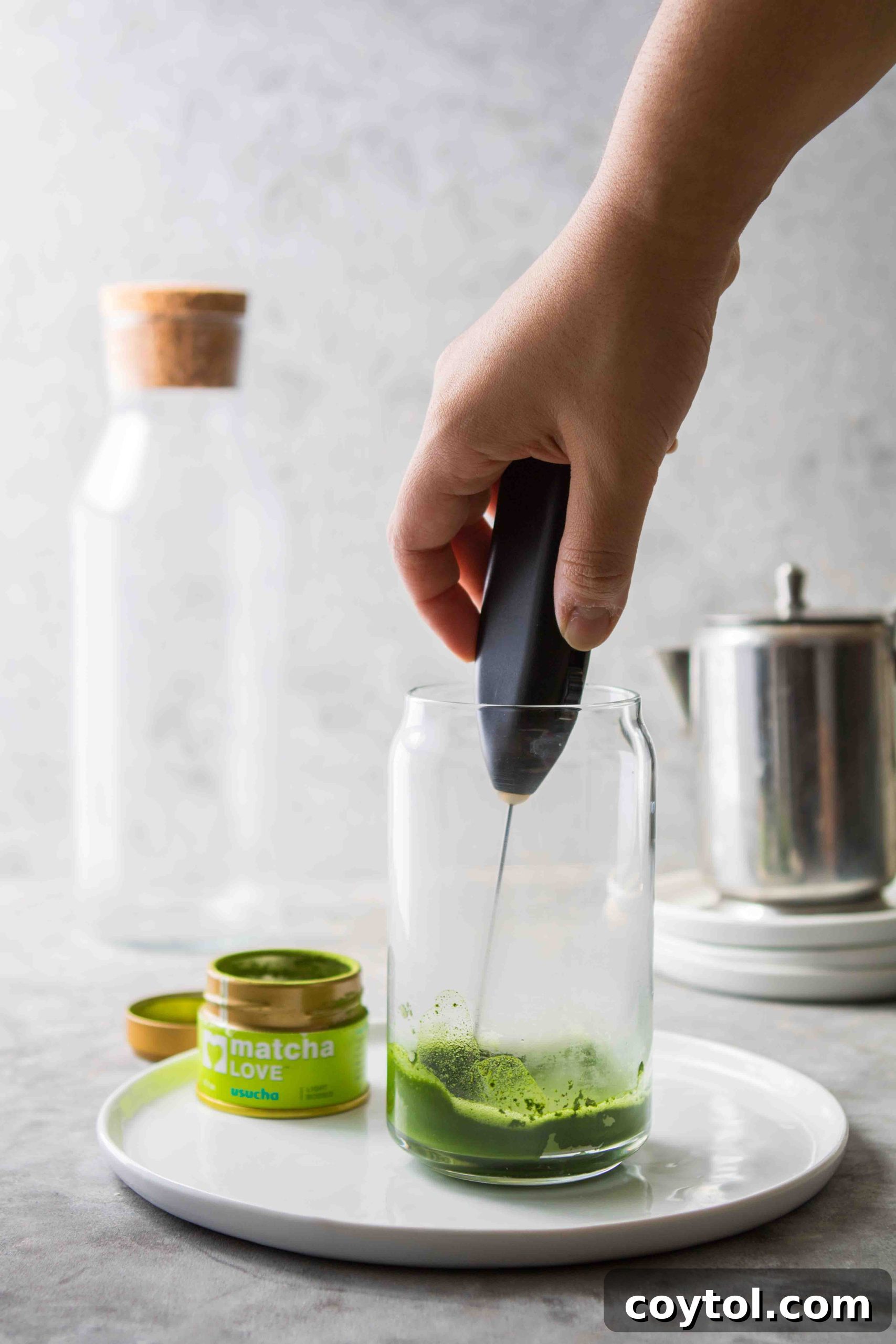 Frothing step to make iced matcha green tea latte