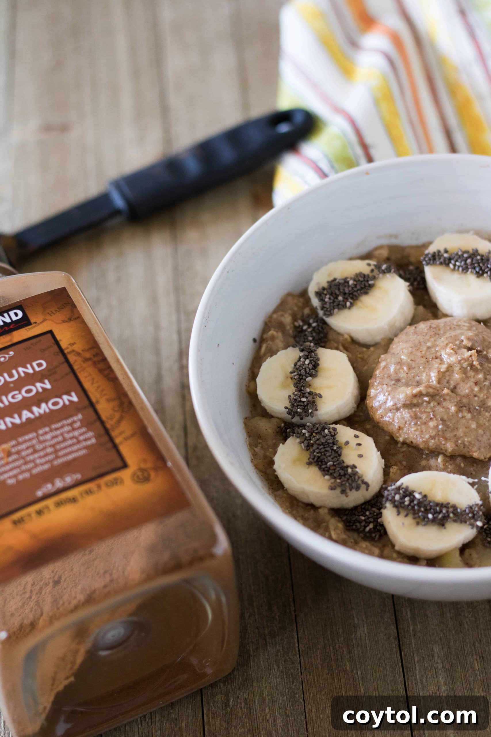 Delicious and healthy banana nut butter oatmeal ready to be eaten for breakfast
