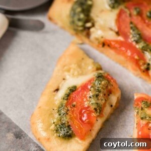 Slice of margarita pesto pizza
