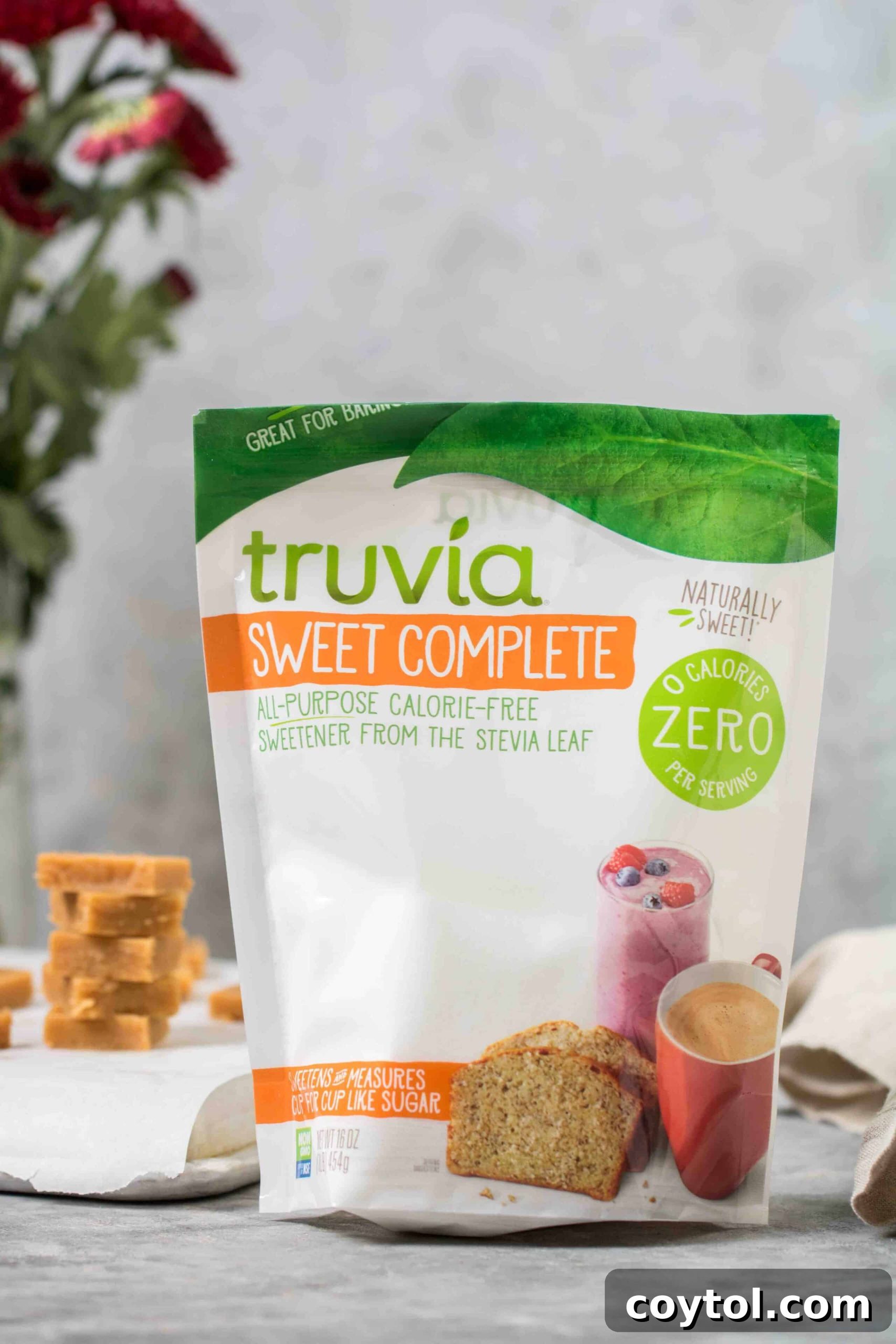 Decadent Small Batch Keto Peanut Butter Fudge 3 Truvia Sweet Complete All-Purpose Sweetener with blurred keto peanut butter fudge in the background, highlighting the key ingredient.