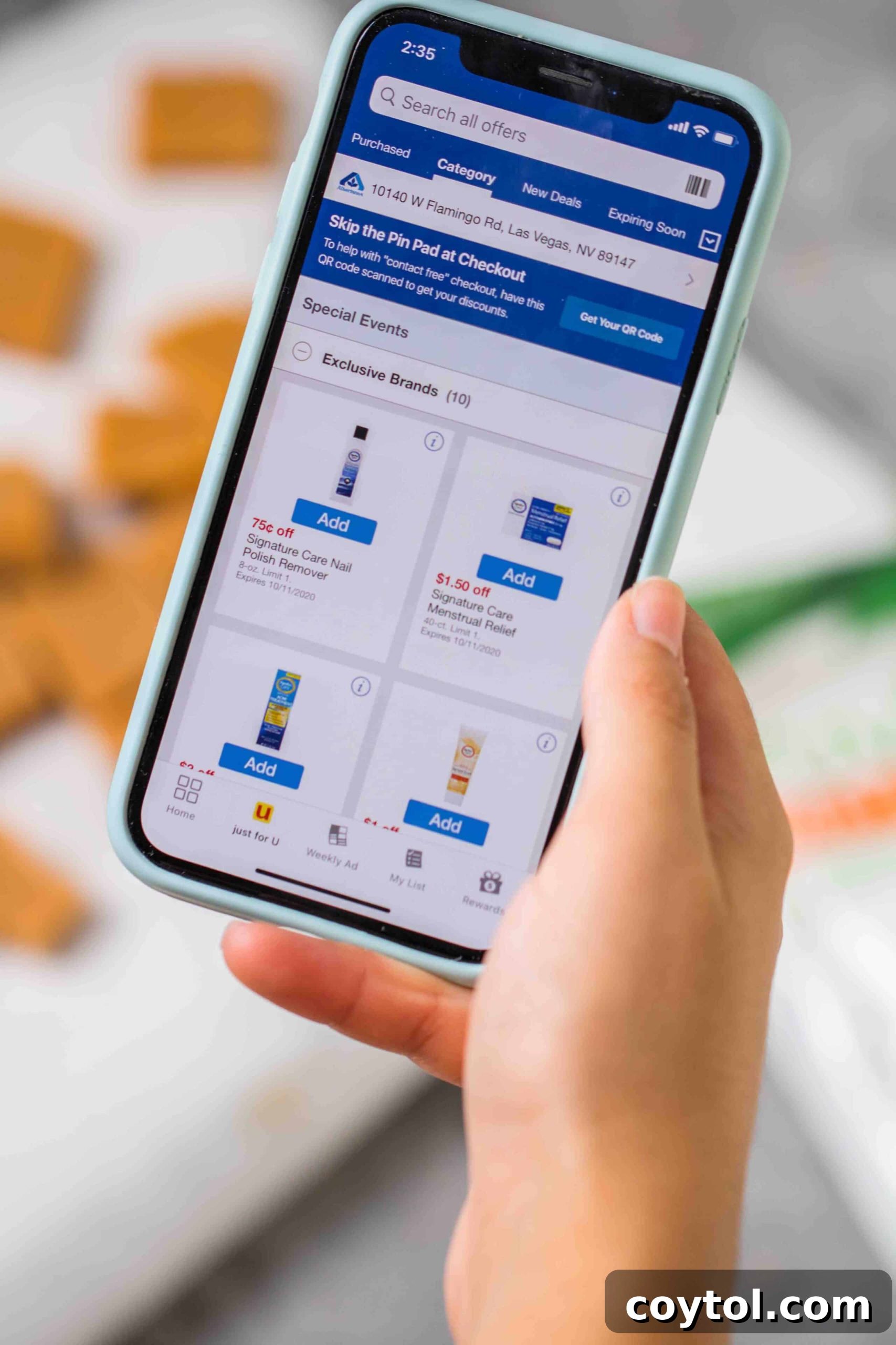 Decadent Small Batch Keto Peanut Butter Fudge 4 Close-up of the Albertsons phone app display, showing digital coupons and shopping lists.