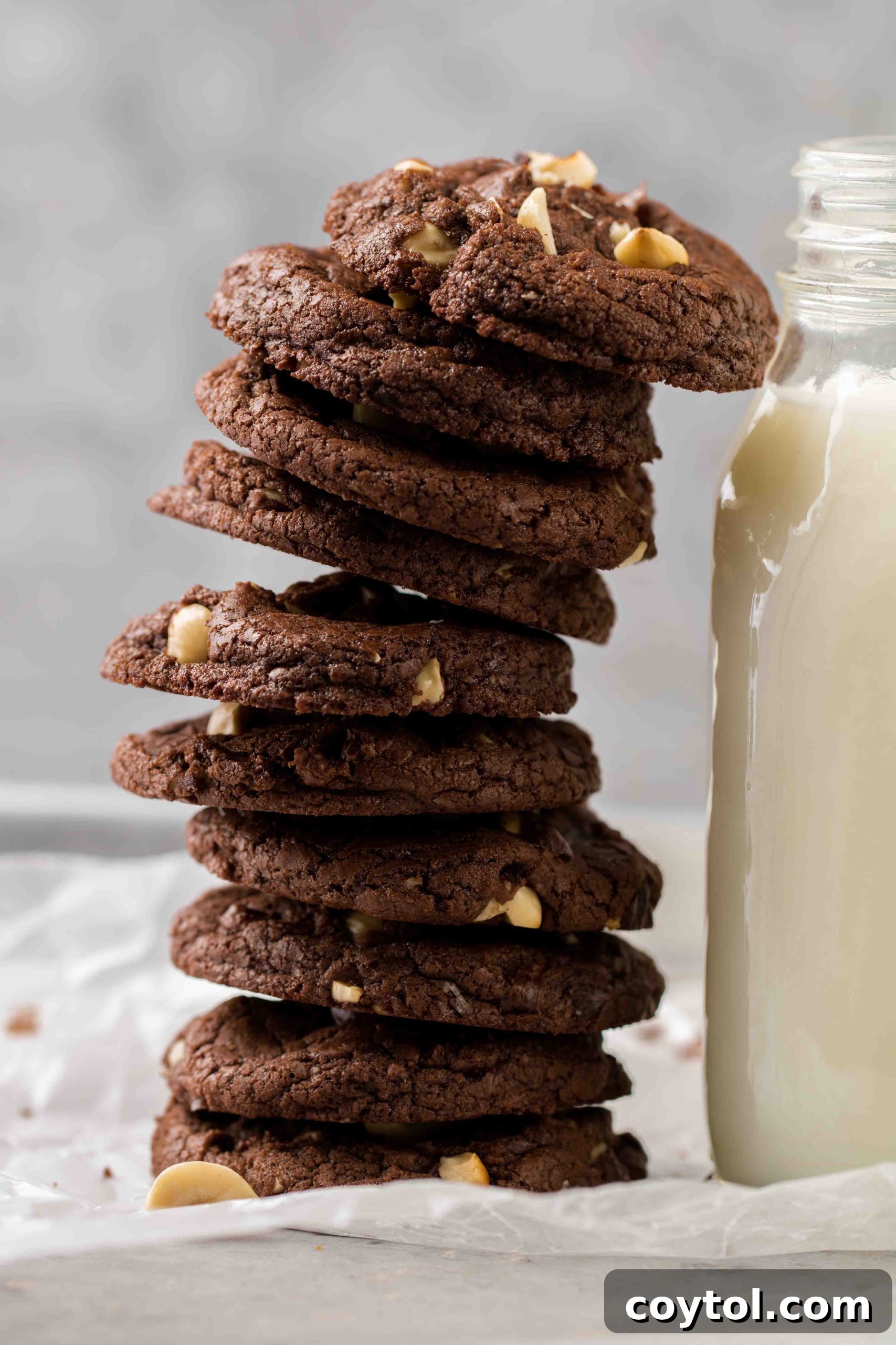 Easy brownie hazelnut cookie stack next to milk